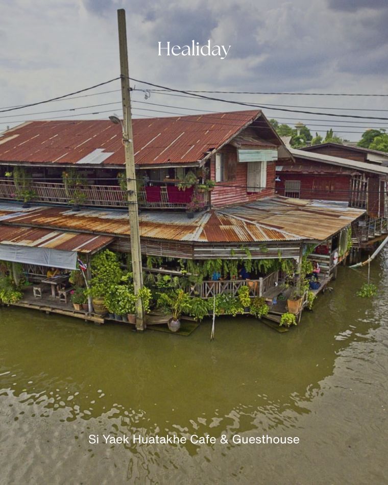 Riverside wooden houses at Si Yaek Huatakhe cafe and guesthouse, Bangkok
